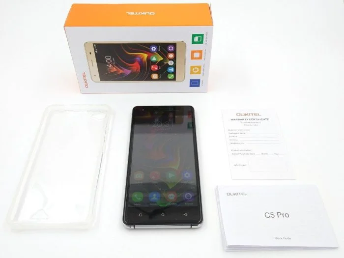 Volumen de entrega con teléfono inteligente, estuche e instrucciones