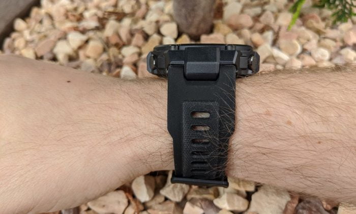 The Amazfit T-Rex on the wrist with a view of the watch strap.