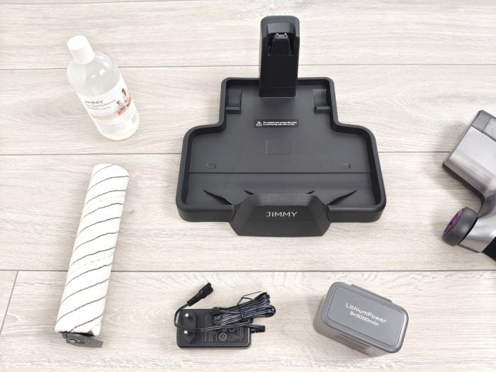 JIMMY HW8 Pro charging station with soft roller, battery and cleaning agent.