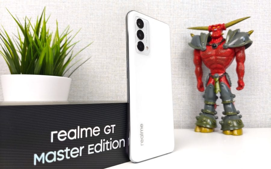 realme GT Master Edition in white with a view of the rear