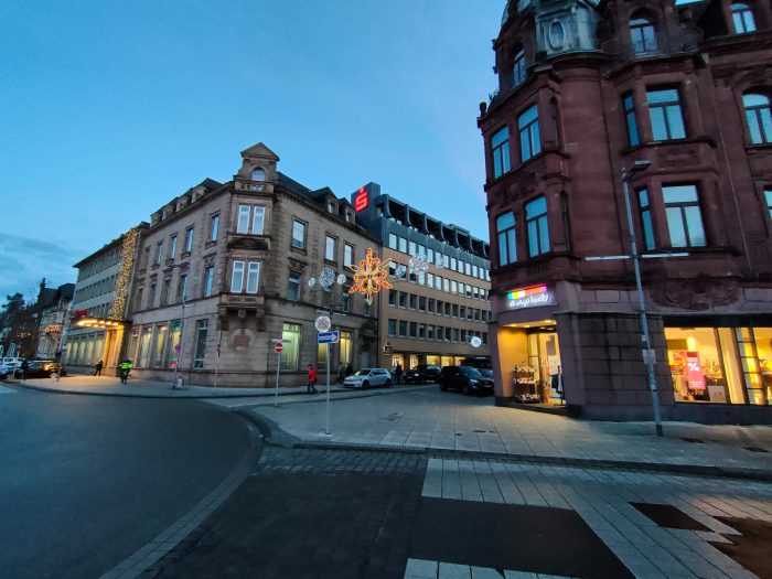 Ultra wide angle shot of city block.