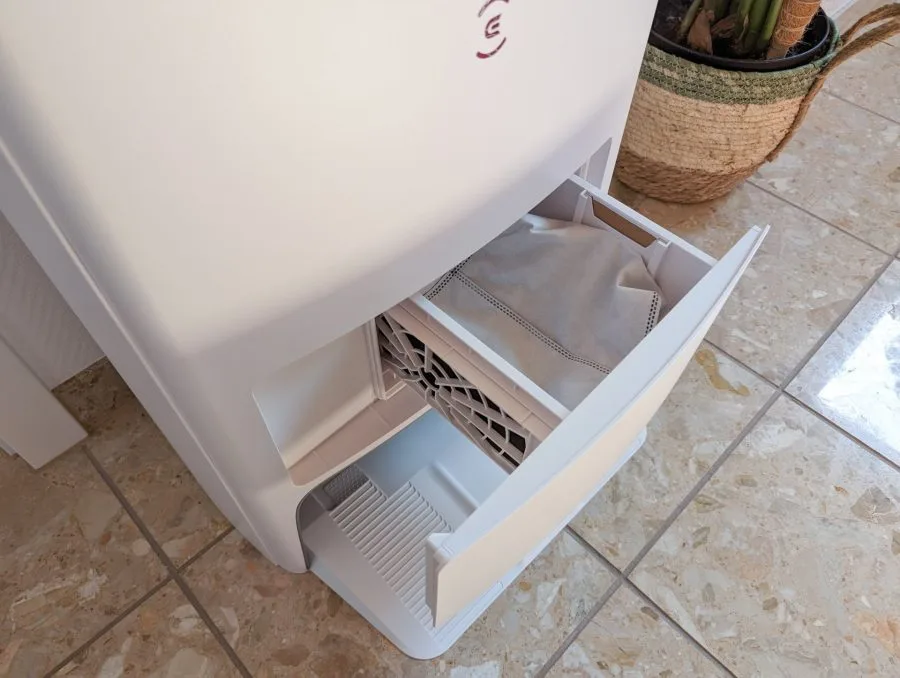 ECOVACS DEEBOT T20 OMNI open drawers with dust bag