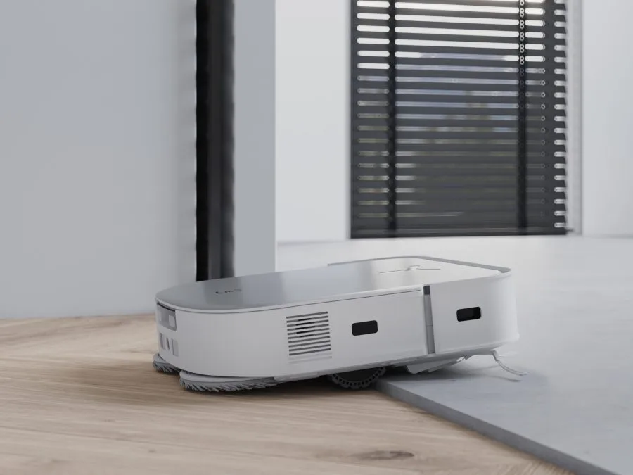 ECOVACS DEEBOT X2 OMNI drives over a doorstep