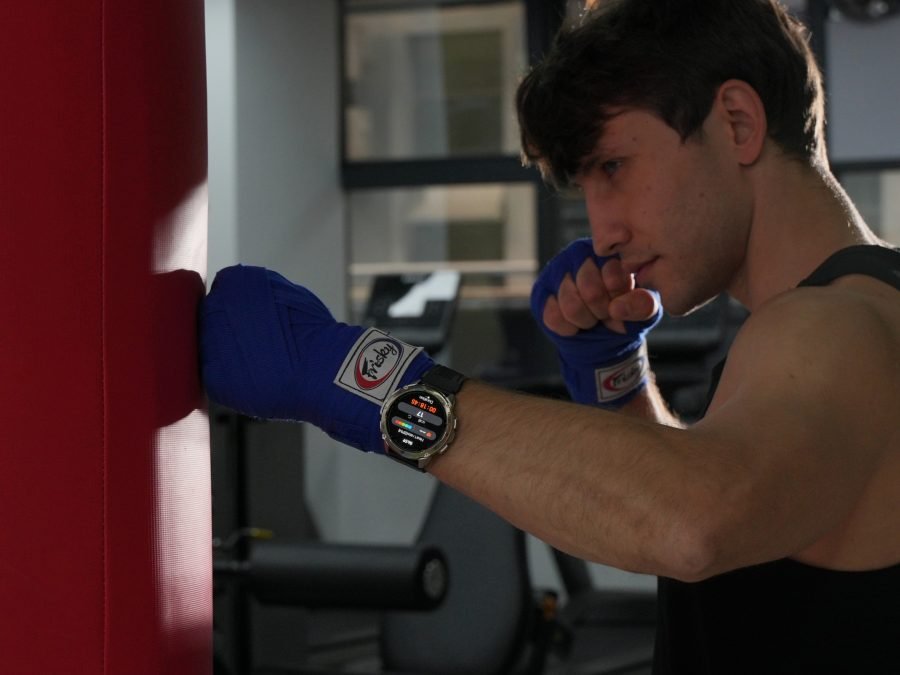 Boxer with KOSPET TANK T3 ULTRA on his wrist
